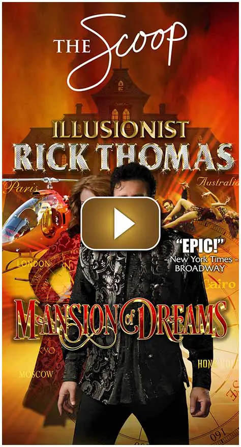 Illusionist Rick Thomas performing a dramatic magic show.
