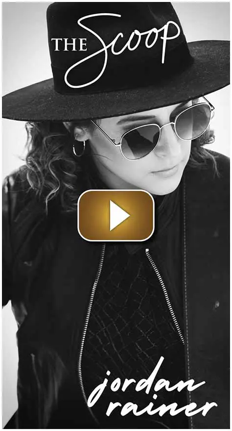 Black and white photo of a person wearing sunglasses and a hat.