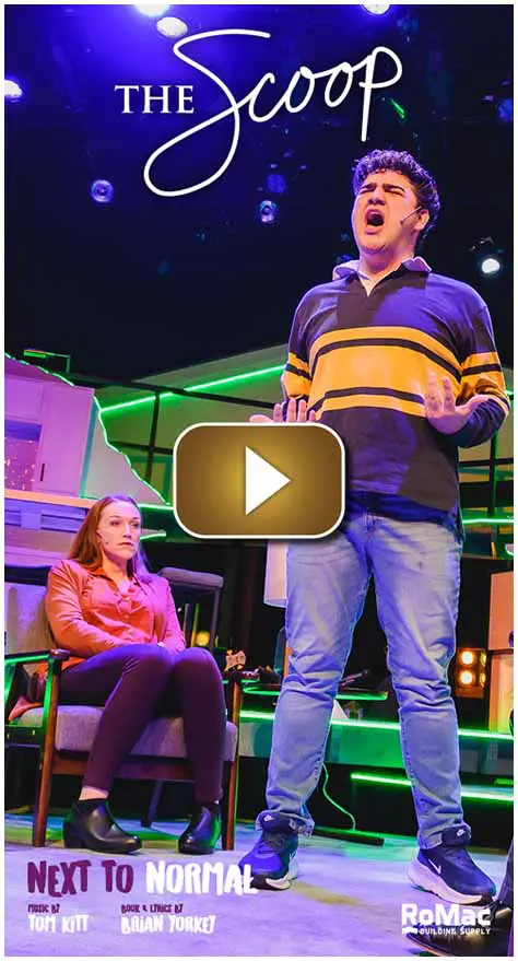 Two actors performing on a colorful stage with dramatic lighting.