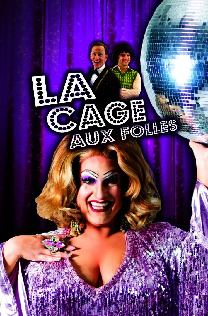 Smiling drag performer in purple sequins, disco ball